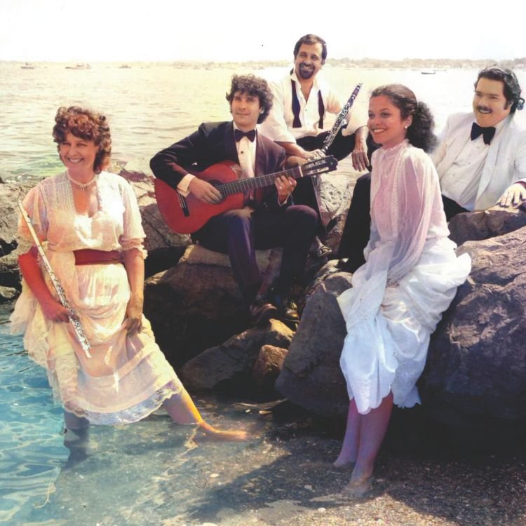 Five professional musicians post as the Scarborough Chamber Players on the North Shore of Boston