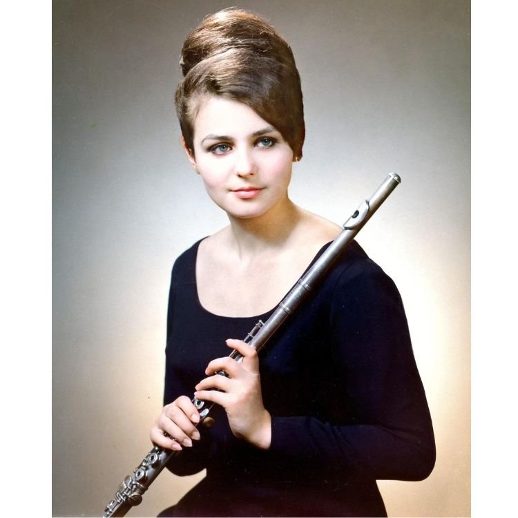 Virginia Sindelar high school graduation photo with flute and 1960s hair style