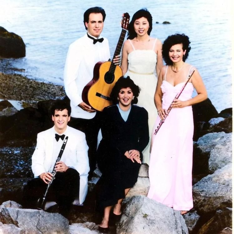 Five Boston musicians enjoy North Shore breezes at the ocean rocks